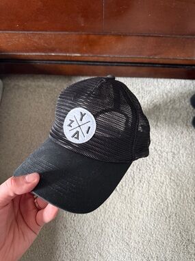 ZYIA Black Mesh Trucker Hat with White Logo Patch